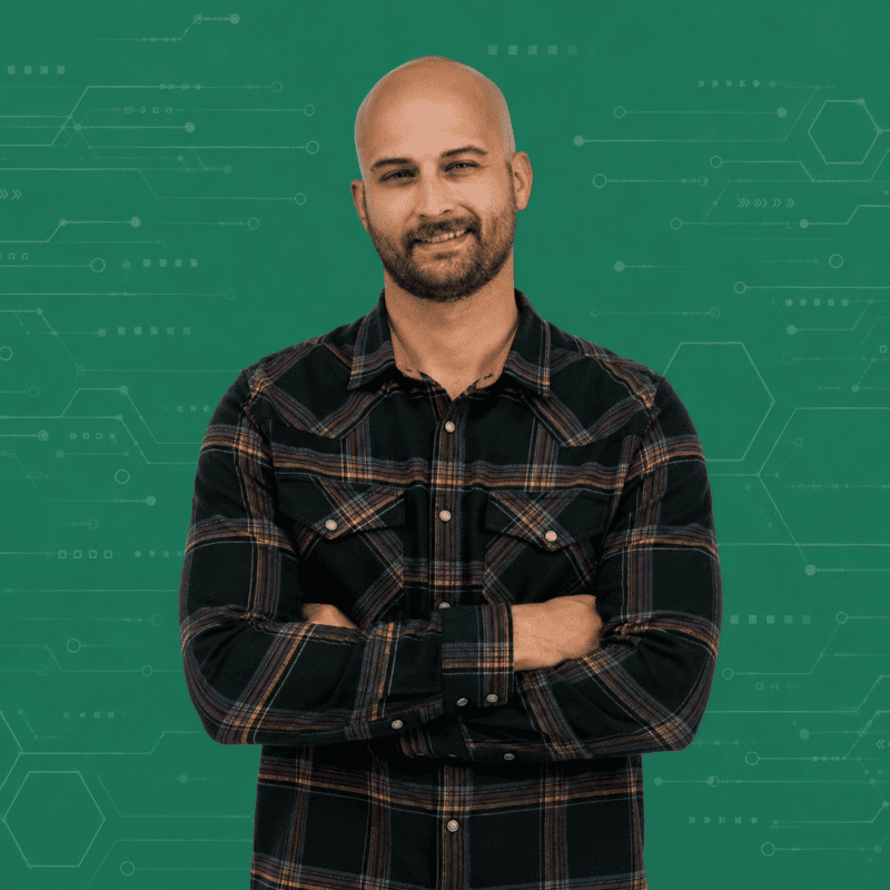 Man in plaid shirt on digital background