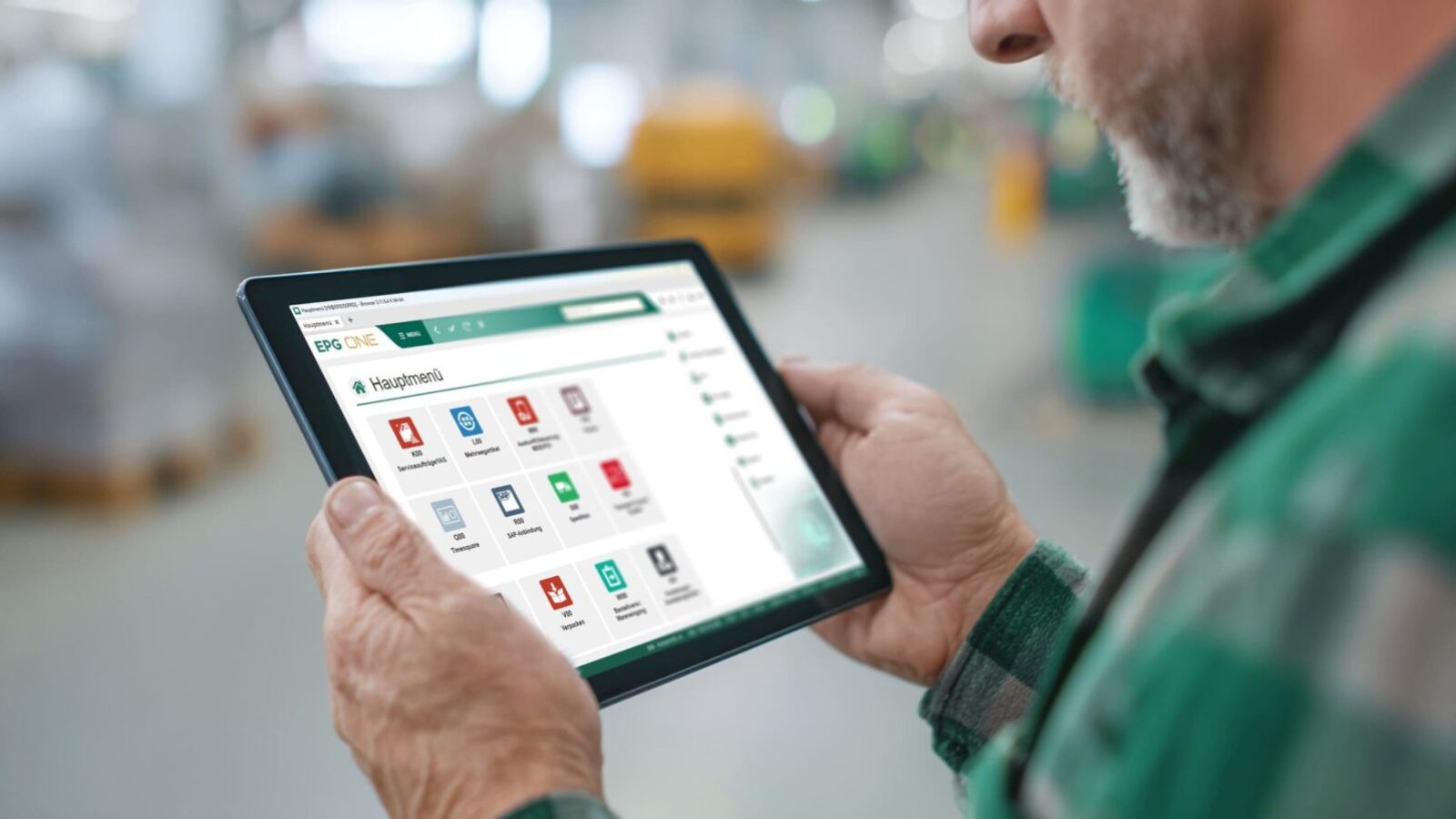 Man looking on EPG One application on his tablet